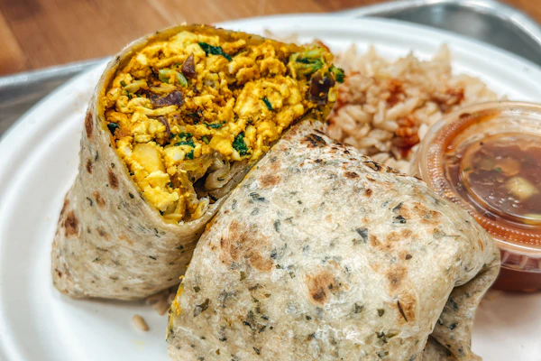 Breakfast burritos filled with scrambled eggs