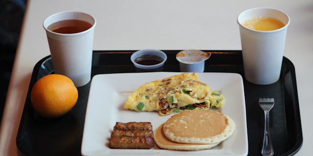 Breakfast tray with eggs and a pancake